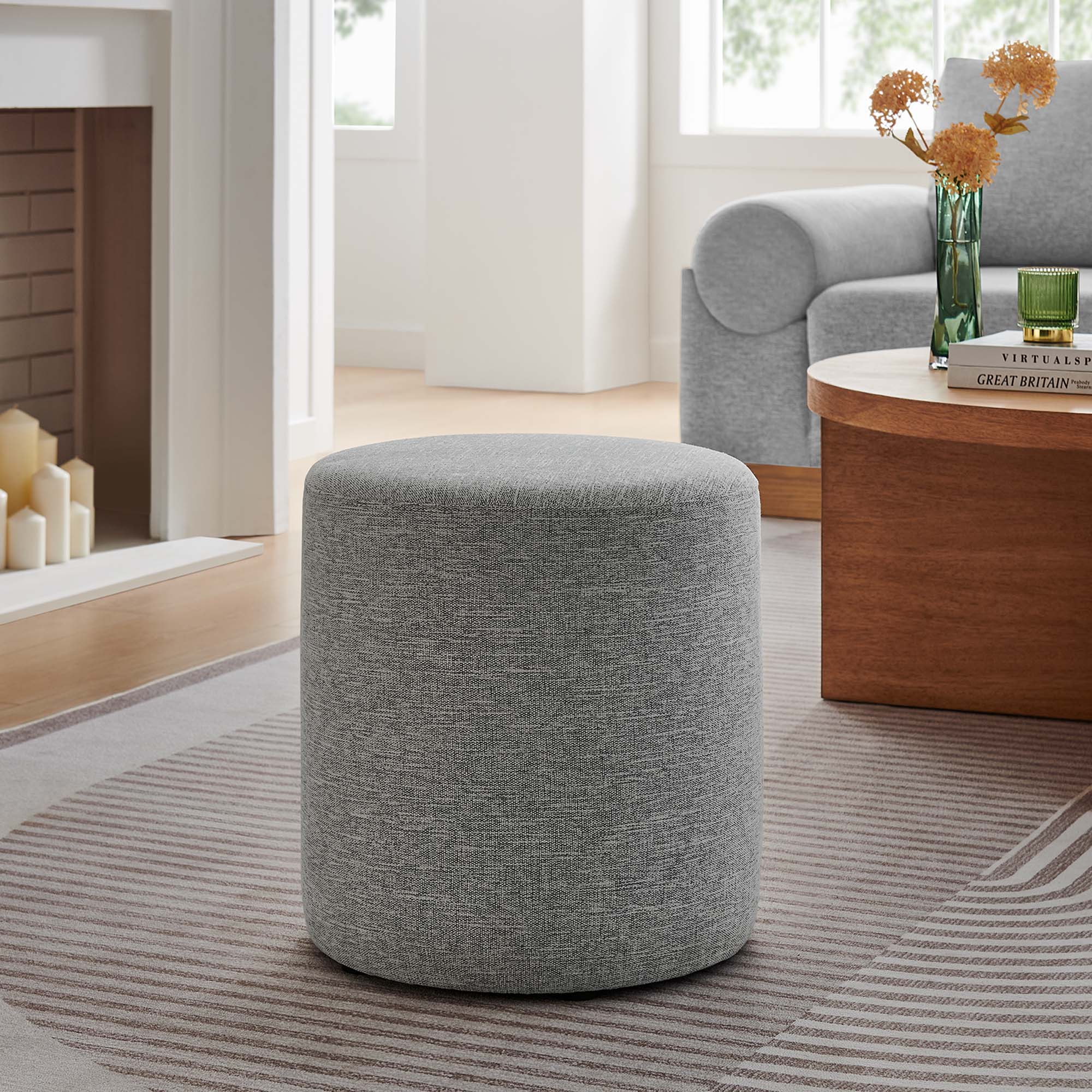 Callum 16" Round Woven Heathered Fabric Upholstered Ottoman in Heathered Weave